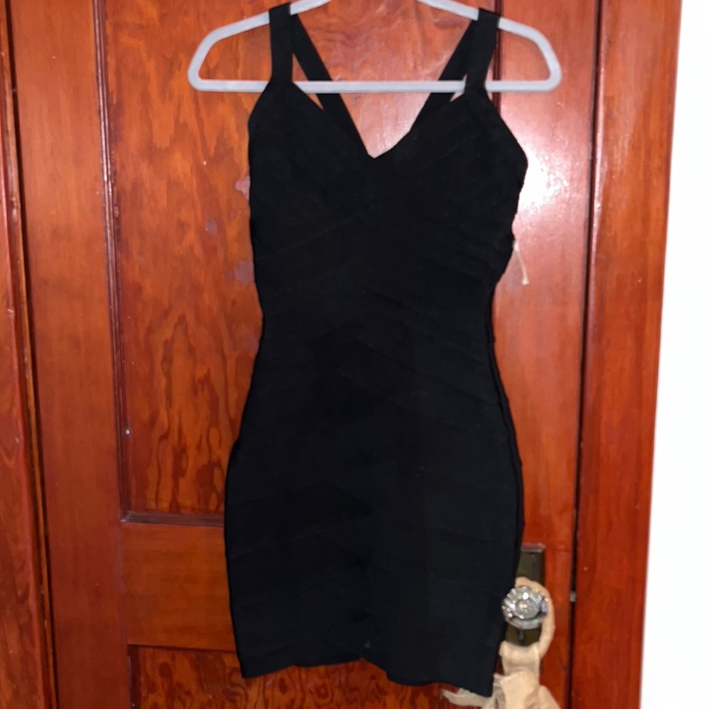Black, bandage dress with cut out detail to back of dress
